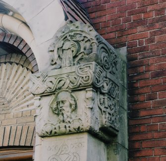 W front. Detail of triple arch sculpture