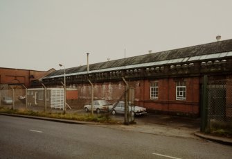 View from North-West of single storey brick range on North side of works.