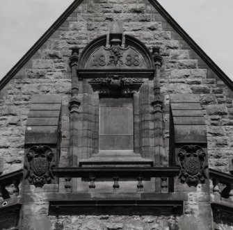 Detail.  SW gable showing carved date '1888'.