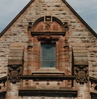 Detail.  SW gable showing carved date '1888'.