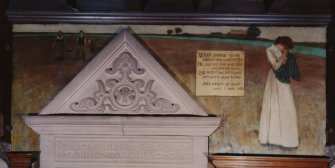 Interior.  Detail of mural and carving above library door in N corridor.