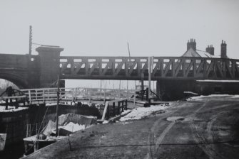 General view of bascule bridge and railway bridge.