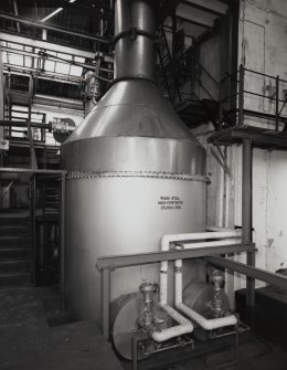 Still House: interior view from SW, showing two steam-heated patent stills, with wash still (25,000) litres in foreground