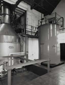 Still House: interior view from WSW, showing wash still (L) and spirit receiver tank (13,006 litres)