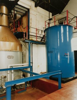 Still House: interior view from WSW, showing wash still (L) and spirit receiver tank (13,006 litres)