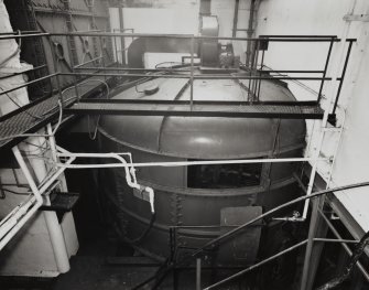 Mash House: elevated view of cast-iron fabricated mash tun, made by Robert Melvin Ltd, Engineers, of Alloa