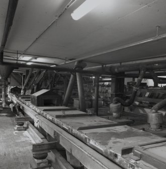 Interior view of the vibratory sugar Vimec Conveyors in the Fine End, used to route sugar to the specific Storage Boxes (T&L No.: 21179/11)