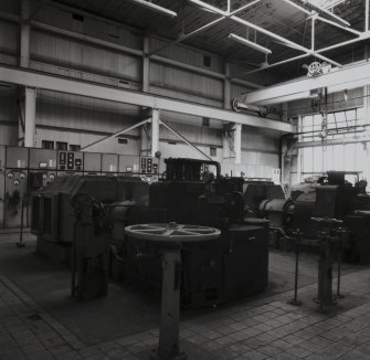 Interior view of the Turbine Room, containing three 1,000kva Turbines, with the overhead crane in the background (T&L No.: 21181/7)