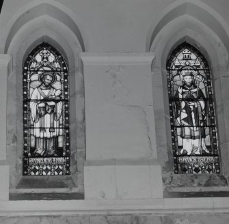 Detail of stained glass windows depicting SS Francis and Vincent