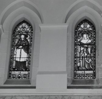 Detail of stained glass windows depicting SS Charles Borromeo and Margaret