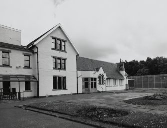 View of lodge and chapel from South West