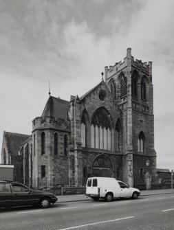 View of entrance front from E