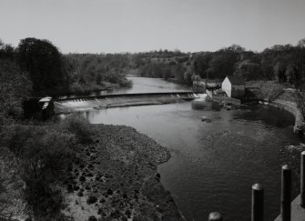 Low Blantyre, Hydro-Electric Power Station
Elevated general view from north of hydro-electric power station, showing weir across River Clyde (centre left), and turbine/valve house and fish ladder (centre right)