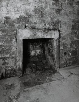 Tower, second floor, detail of fireplace