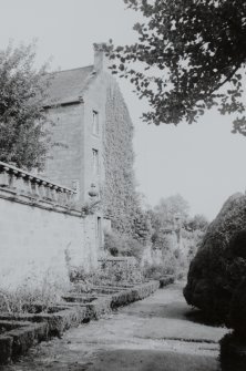 General view of house and garden.