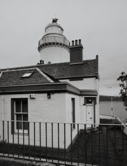 View of lighthouse and cottage from E