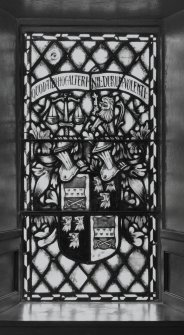 Interior. Ground floor NE aisle detail of heraldic stained glass window
