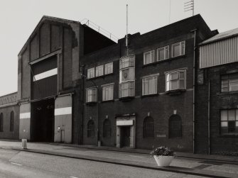 View from NW of centre of N frontage of works, containing  offices and N gable of Assemby Shop, photographed 10 August 1993
