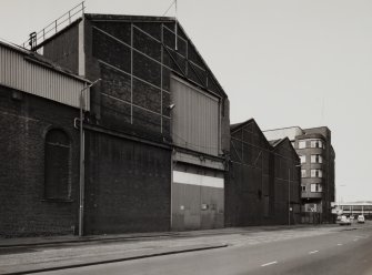 View from NNE of central part of N frontage onto East Hamilton Street, the area of the works containing Assembly and Fitting Shops, photographed 10 August 1993
