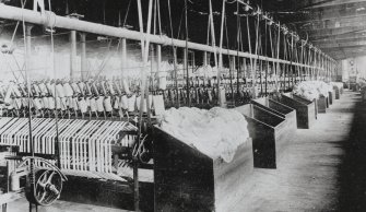 Copy of historic photograph showing interior view of reeling department.