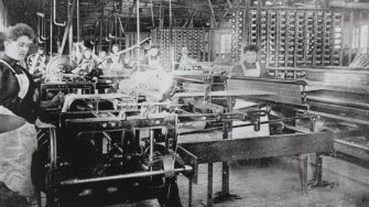 Copy of historic photograph showing interior view of warping department.