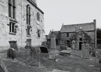 View with churchyard from west