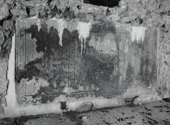 Interior, view of inscribed slab on north wall