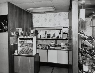 Interior.
View of front section of shop and window.