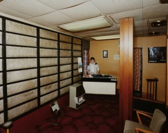 Interior.
View from E of ladies' fitting room.