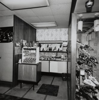 Interior.
View of front section of shop and window