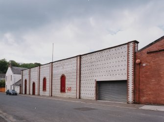 View of E facade of works fronting onto Union Street, comprising polychrome pattern of mostly white-glazed Ayrshire fireclay brick