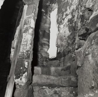 Interior.
View of doorway to parapet from spiral stair at top floor.