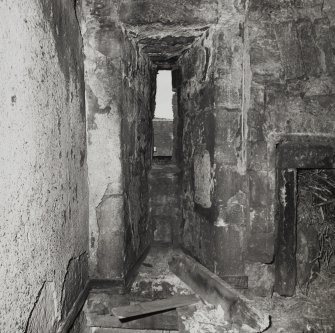 Interior.
Detail of slit window on W wall of second floor.