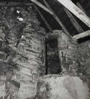 Interior.
View of doorway to attic in top floor.