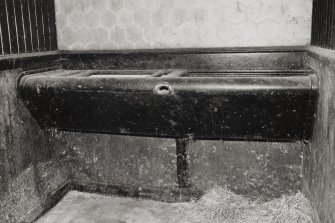 Interior.
View of cast iron trough in North stables.