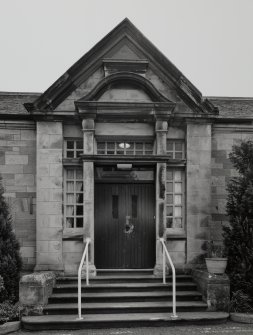 I.P.C.U. Building. View from W. Detail of main door