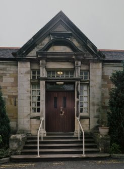 I.P.C.U. Building. View from W. Detail of main door