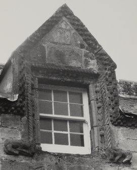 Detail of pedimented window.