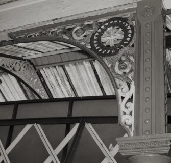 Detail of typical ornate cast-iron bracket