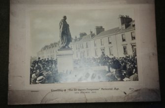 Photographic copy of photograph from sale of contents of Ladykirk House, by Phillips, 23-4 Sept 1997.
View of unveiling.
Insc: 'Unveiling of "The Sir James Fergusson" Memorial Ayr. 15th October 1910'.
Insc: 'J Nimmo Aug 1908'.