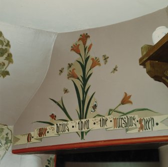 Interior.
Detail of alcove motto in top floor bedroom.