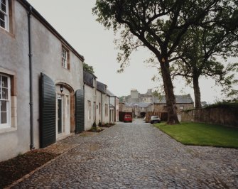 View of outbuildings from W.