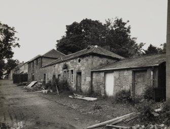 View of outbuildings from SE.