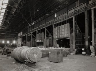 Dressing Shop: view from NNE showing roll awaiting treatment in one of five bogie annealing furnaces, each gas-fired, and made by Burdon of Glasgow