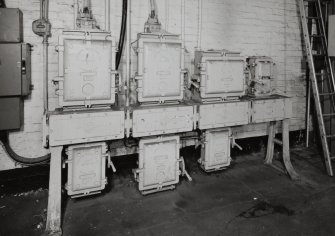 Motherwell, Craigneuk Street, Anderson Boyes
Machine Shop (Dept. 66, adjacent to Fitting Shop, built 1942): Interior detail of panel of large Anderson Boyes electrical switches at north end of west bay.  These switches are typical of the electrical products once produced by the company