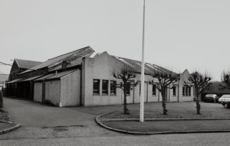 Motherwell, Craigneuk Street, Anderson Boyes
Exterior view from north west of west facade (rendered) of  Purchase Department offices (built in 1908), with Record Store (also built in 1908) visible in background (left)