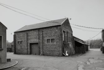 Motherwell, Craigneuk Street, Anderson Boyes
Exterior view from north east of Pattern Store, with Record Store on upper floor (building erected in 1908).  The steel-framed awning was built by A & J Main of Glasgow