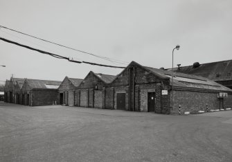 Motherwell, Craigneuk Street, Anderson Boyes
Exterior view from south west of range of bays containing stores and production control labs (from right to left, dating from 1942, 1937, 1951 and 1955)