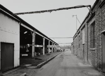 Motherwell, Craigneuk Street, Anderson Boyes
Exterior view from south showing open-sided stores (left, erected in 1957), and to right, west side of new Machine Shop (built in 1942)