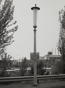 General view of lamp standard outside headquarters building on W side.